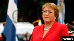 FILE - Chile's President Michelle Bachelet, pictured at a ceremony in Buenos Aires in 2014, says new anti-corruption measures will end influence peddling and allow greater oversight of political finances. 