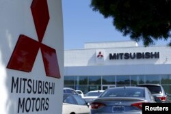 FILE - A Mitsubishi Motors dealership is shown in Poway, California, July 27, 2015.