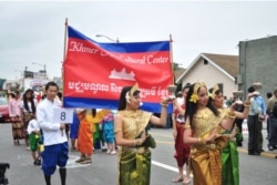 FILE- Cambodian traditional dancers give blessing during an annual parade in the designated 'Cambodia Town' section of Long Beach, California, on April 2, 2011, to celebrate Khmer New Year.