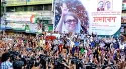 Supporters of Bangladesh’s main opposition party of BNP demand that their leader former PM Khaleda Zia be allowed to travel outside the country for medical treatment, during a protest in Dhaka, Nov. 30, 2021.
