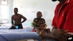 FILE - Typhoid patients in Harare, Zimbabwe.