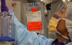 Chemotherapy medicine is prepared for a liver cancer patient at the National Institutes of Health in Bethesda, Maryland