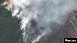 A satellite image shows the 416 Wildfire burning west of Highway 550 and northwest of Hermosa, Colorado, June 10, 2018. 