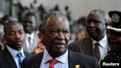 Zambia's President Michael Sata speaks to journalists at the 18th African Union summit in Ethiopia's capital, Addis Ababa, Jan. 2012 file photo.