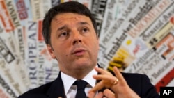 Italian Premier Matteo Renzi listens to a reporter's question during a press conference at Rome's foreign press association, Feb. 22, 2106. 