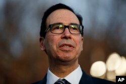 FILE - Treasury Secretary Steven Mnuchin talks with reporters at the White House, in Washington, Dec. 3, 2018.