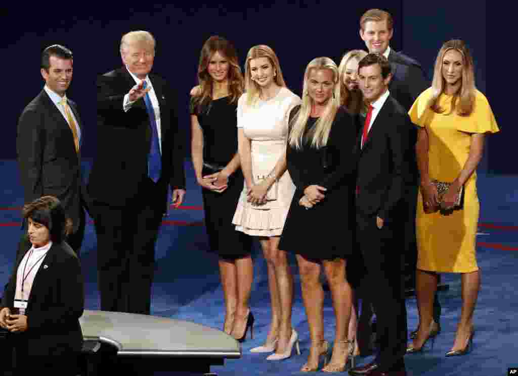 From left, Donald Trump Jr., Republican nominee Donald Trump, his wife, Melania Trump, Ivanka Trump and other family members appear on stage after the presidential debate at Hofstra University in Hempstead, N.Y., Sept. 26, 2016. 