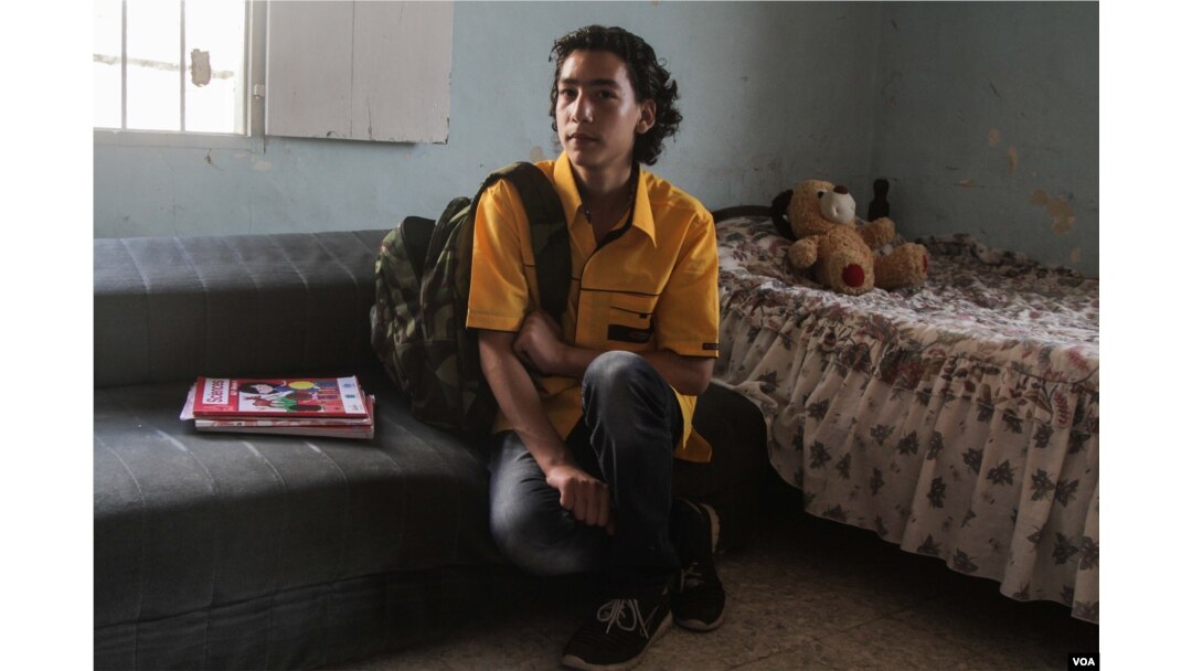 Nidal, 15, dreams of becoming an engineer. He has not been able to attend full-time education since he fled Syria with his family in 2011, Beirut, Lebanon, Sept. 17, 2015. (VOA / J. Owens)