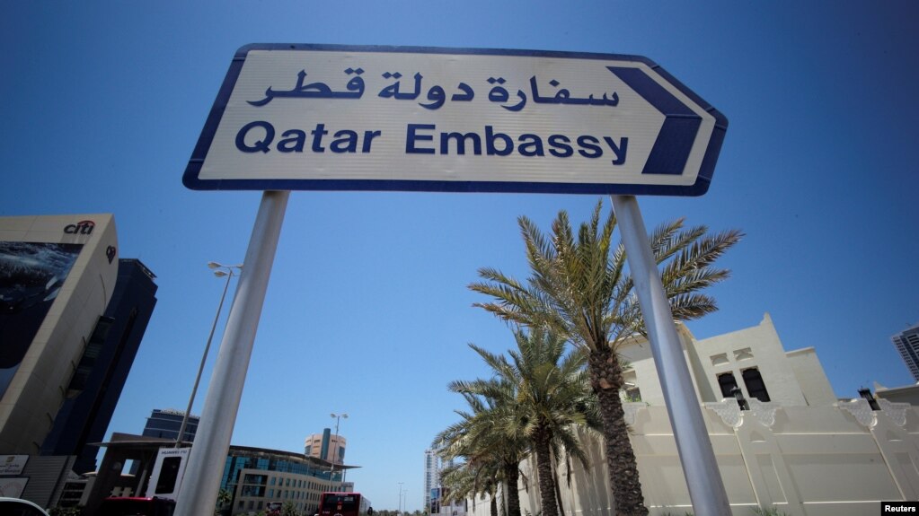 A sign indicating a route to Qatar embassy is seen in Manama, Bahrain, June 5, 2017. 