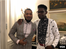 DC Fashion Week founder Ean Williams, left, with Haitian designer Victor Glemaud at the Haitian Embassy fashion event in Washington D.C., Feb. 23, 2018. (VOA / S. Lemaire)