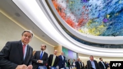 FILE - UN Secretary-General Antonio Guterres (L) looks on at the opening of the United Nations Human Rights Council, Feb. 27, 2017 in Geneva.