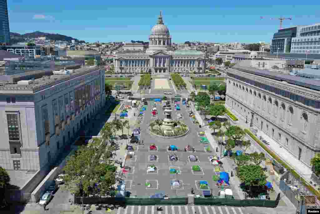 Tents are set up following social distancing at a homeless encampment called Safe Sleeping Village, next to city hall in San Francisco, California, May 19, 2020.