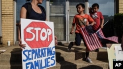 People protest against recent U.S. immigration policy that separates children from their families when they enter the US as undocumented immigrants, in front of a Homeland Security facility in Elizabeth, New Jersey, June 17, 2018.