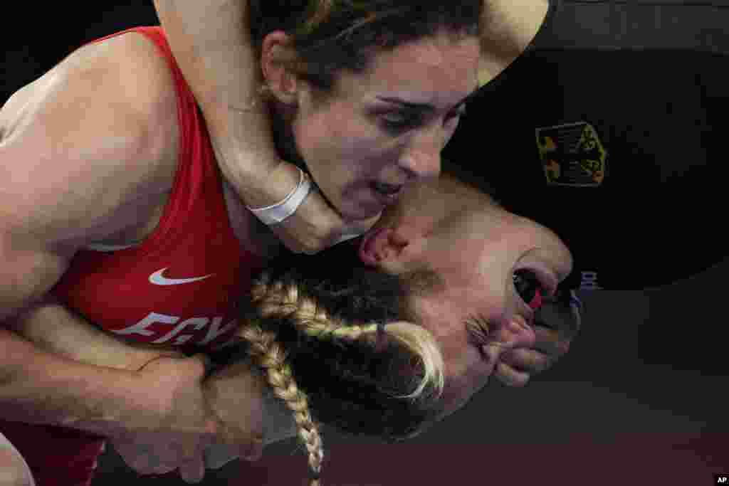 Germany&#39;s Anna Carmen Schell, right, reacts during her batlle against Egypt&#39;s Enas Ahmed at the women&#39;s 68kg freestyle wrestling match at the 2020 Summer Olympics in Chiba, Japan.