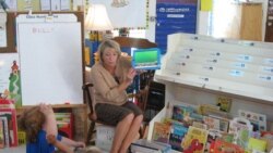 Teacher Laurie Gerard uses iPads with her kindergarten students in Auburn, Maine