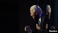 Joe Biden, calon presiden AS dari Partai Demokrat, merayakan kemenangan dalam pilpres AS 2020, di Wilmington, Delaware, Sabtu, 7 November 2020.