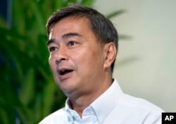 The leader of Thailand's Democrat Party Abhisit Vejjajiva talks to The Associated Press during an interview Wednesday, March 20, 2019, in Bangkok, Thailand.