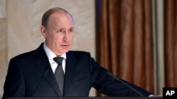 Russian President Vladimir Putin speaks before officials of the Federal Security Service in Moscow, March 26, 2015. 