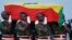 Ghanaian soldiers carry the coffin of former U.N. Secretary-General Kofi Annan, wrapped in the flag of Ghana, to a hearse upon arrival at the Kotoka International Airport in Accra, Ghana, Sept 10, 2018.