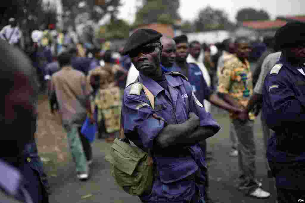 Police Nationale du Congo (PNC) officers gather at a stadium to be briefed by commanders, Goma, eastern Congo, December 3, 2012.