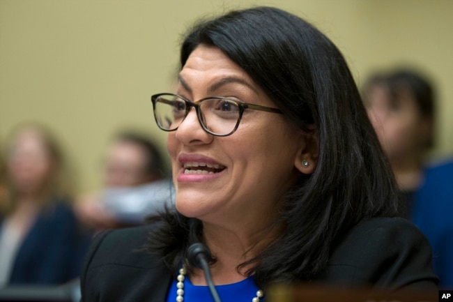 Rep. Rashida Tlaib, D-Mich., questions Michael Cohen, President Donald Trump's former lawyer, as he testifies before the House Oversight and Reform Committee, on Capitol Hill, Feb. 27, 2019, in Washington.