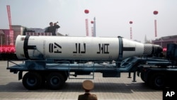 In this April 15, 2017 photo, a submarine missile is paraded across Kim Il Sung Square during a military parade, in Pyongyang, North Korea to celebrate the 105th birth anniversary of Kim Il Sung, the country's late founder.