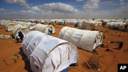 In this photo taken Friday, Aug. 5, 2011 tents are seen at the UNHCR's Ifo Extension camp outside Dadaab, eastern Kenya, 100 kilometers (62 miles) from the Somali border