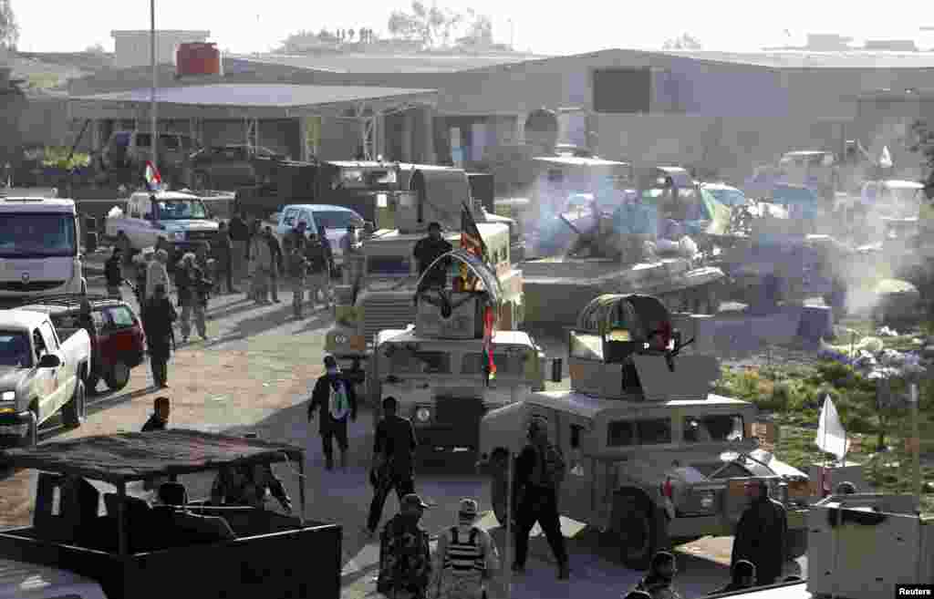 Lực lượng an ninh Iraq và Shia&nbsp;đụng độ với các tay súng Nhà Nước Hồi Giáo trong tỉnh Saladin, ngày 2/2/2015.