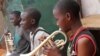 The children living at M-lisada practice their instruments every day, Kampala, Uganda, Oct. 11, 2013. (VOA/Hilary Heuler)