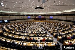FILE - A view of the European Parliament during a plenary session.
