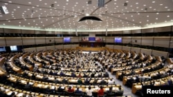 FILE - View of the European Parliament during a plenary session in Brussels, Belgium. Four top European leaders hold talks on March 6, 2017, on the future of the European Union, at a time when it faces multiple crises that are sparking doubts about its very existence. 