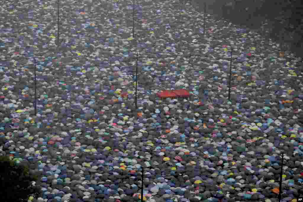 Protesters gather on Victoria Park in Hong Kong. Thousands of people streamed into the park for what organizers hope will be a peaceful demonstration for democracy in the semi-autonomous Chinese territory.