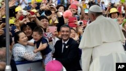 Pope's arrival for the Closing Holy Mass of the 6th Asian Youth Day at Haemi Castle in Haemi, south of Seoul, South Korea, Sunday, Aug. 17, 2014. 