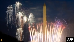 Fireworks burst over Washington Monument at the National Mall during Independence Day celebrations in Washington, DC on July 4, 2020. 