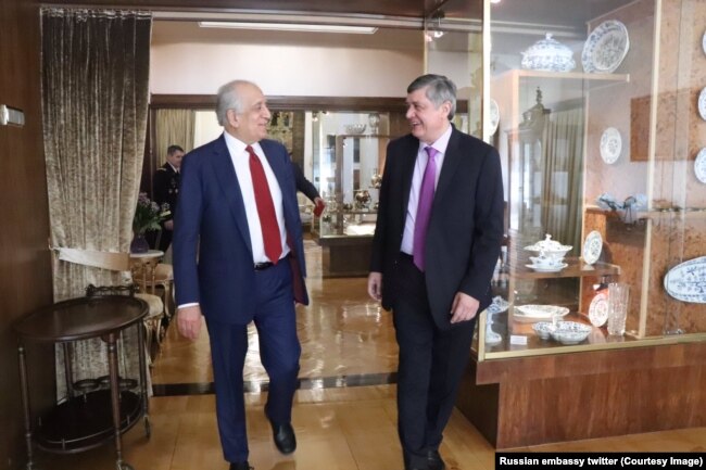 FILE - Afghan-born special reconciliation representative Zalmay Khalilzad meets with Russian envoy Zamir Kabulov in the Russian embassy in Ankara, Turkey.