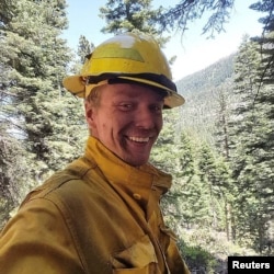 FILE - Firefighter Michael Hallenbeck, in a handout photo provided by the United States Department of Agriculture Forest Service (USDA), died Saturday of injuries received while battling a wildfire at the Lake Tahoe Basin fire in California.