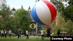 Students enjoy a game on the University of Oregon campus in Eugene, Oregon.