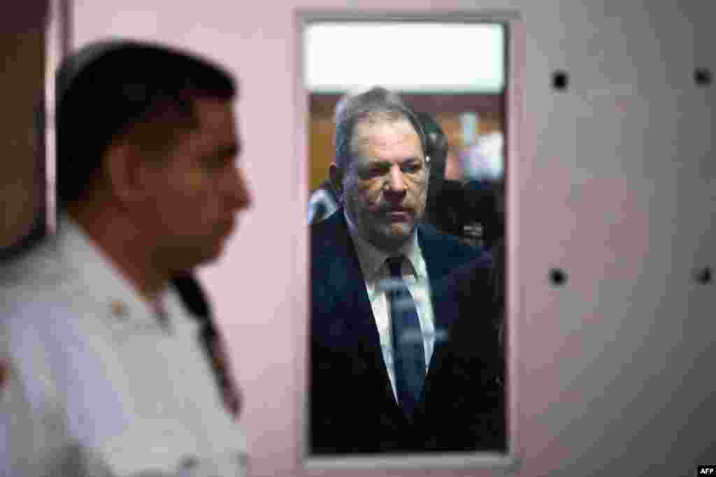 Harvey Weinstein exits the Manhattan Criminal Court room in New York.