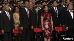 Former Hong Kong Chief Executives Tung Chee-hwa (front L), Donald Tsang (front R), new Hong Kong Chief Executive Leung Chun-ying (front 2nd L), his wife during a ceremony in Hong Kong, July 1, 2012.