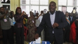 Congolese president Joseph Kabila casts his ballot in the country's presidential election at a polling station in Kinshasa, Democratic Republic of Congo, Monday Nov. 28, 2011