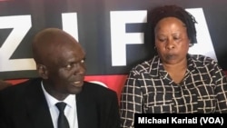 Zifa president Felton Kamambo and board member Barbara Chikosi.