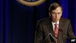David H. Petraeus, former army general and head of the Central Intelligence Agency, speaks at the annual dinner for veterans and ROTC students at the University of Southern California, in Los Angeles, March 26, 2013.