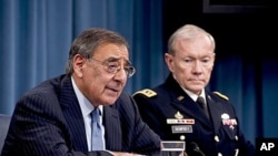 Defense Secretary Leon E. Panetta and Army Gen. Martin E. Dempsey, chairman of the Joint Chiefs of Staff brief the media in the Pentagon Briefing Room on major budget decisions stemming from the defense strategic guidance, January 26, 2012.