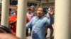 Political analyst Kim Sok appeared at the court February 17, 2017. He was charged and sent to a pre-trial detention following hours of questioning by Cambodian prosecutors. (Hean Socheata/VOA Khmer)