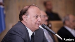 Yemeni Vice President Abdo Rabu Mansour al-Hadi addresses a meeting of the ruling General People's Congress party in Sanaa December 7, 2011. Hadi issued a decree on Wednesday setting up a unity government headed by opposition leader Mohammed Basindwa.