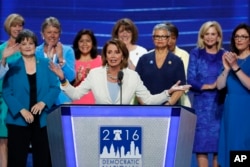 House Minority Leader Nancy Pelosi of Calif., speaks as she stands with Democratic legislators during the second day of the Democratic National Convention in Philadelphia, Tuesday, July 26, 2016.