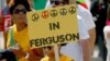 Reli Tandingan Berlangsung di Ferguson, Suasana Tenang Bertahan