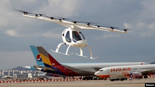 A test flight of the "Volocopter 2X" drone taxi during an Urban Air Mobility Airport Demo event at Gimpo Airport in Seoul, South Korea, November 11, 2021. (REUTERS/Heo Ran)