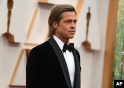 Brad Pitt arrives at the Oscars on Sunday, Feb. 9, 2020, at the Dolby Theatre in Los Angeles. (Photo by Richard Shotwell/Invision/AP)