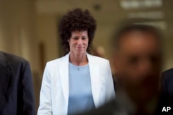 FILE - Andrea Constand arrives during Bill Cosby's sexual assault trial at the Montgomery County Courthouse in Norristown, Pennsylvania, June 7, 2017.